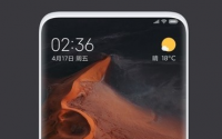 小米手机正面采用窄边框设计上下和左右对称